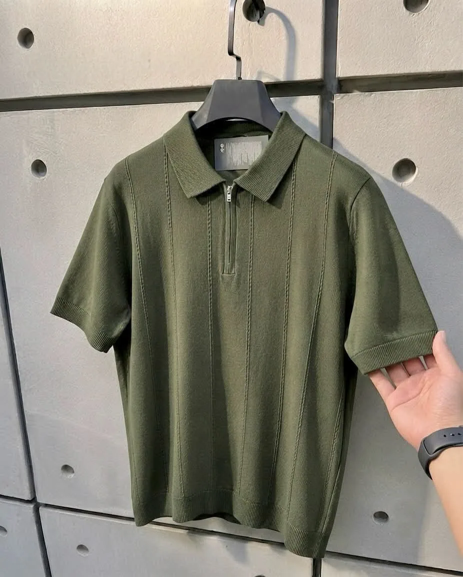 Olive textured zip polo on hanger