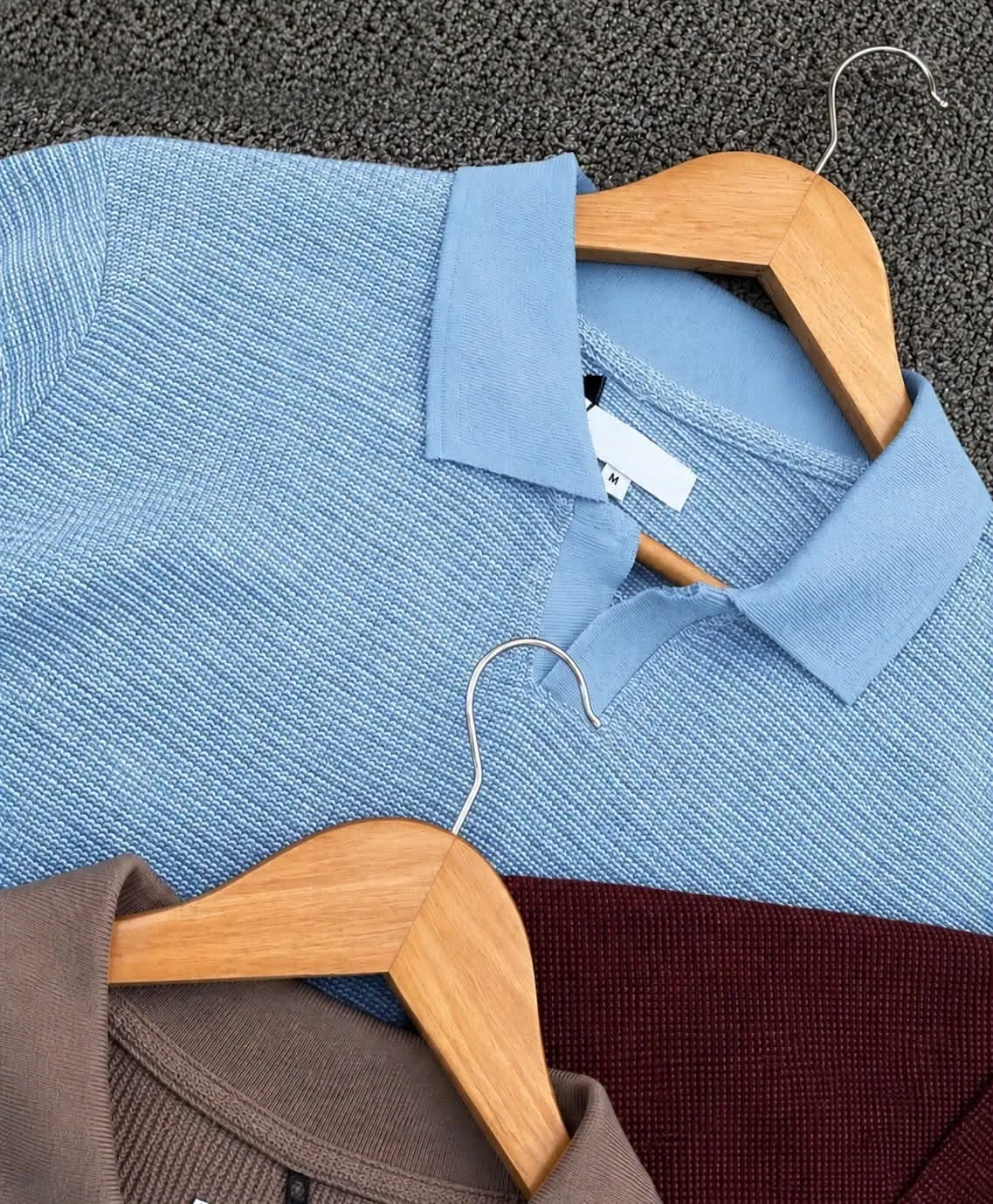 Light blue textured polo collar detail