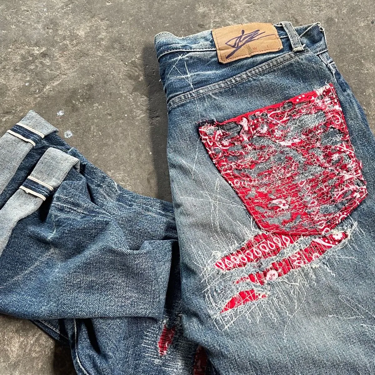 Custom denim patchwork and repair detail